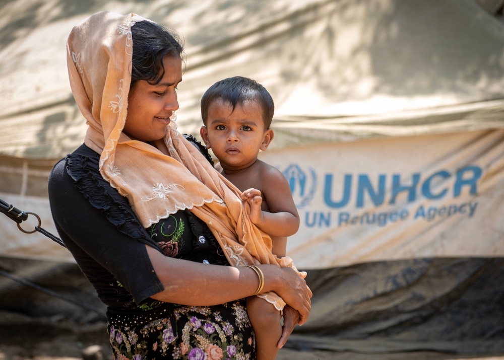 Rohingya,Refugee,Are,Seen,During,Food,Distribution,At,The,Kutupalong