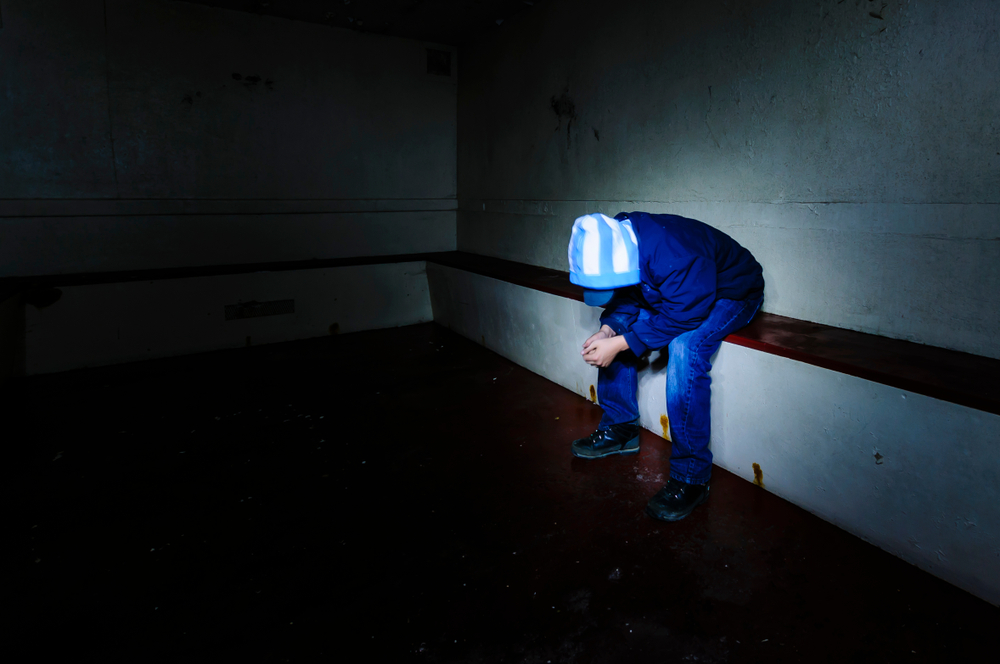 Teenage,Youth,Sits,Remorsefully,In,A,Prison,Cell